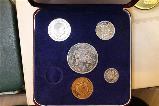 A collection of cased Franklin coin sets